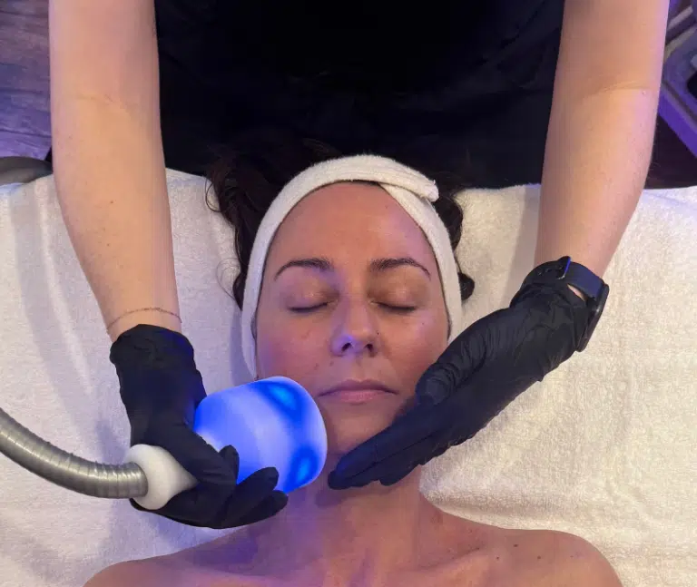 Woman getting a facial in Edmonds at 212 Med Spa